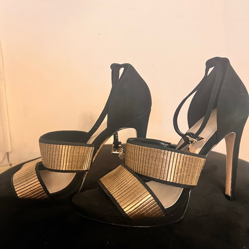 Black and gold brand new. No box. With price tag